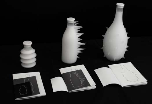Moo(?) bottles and printed matter