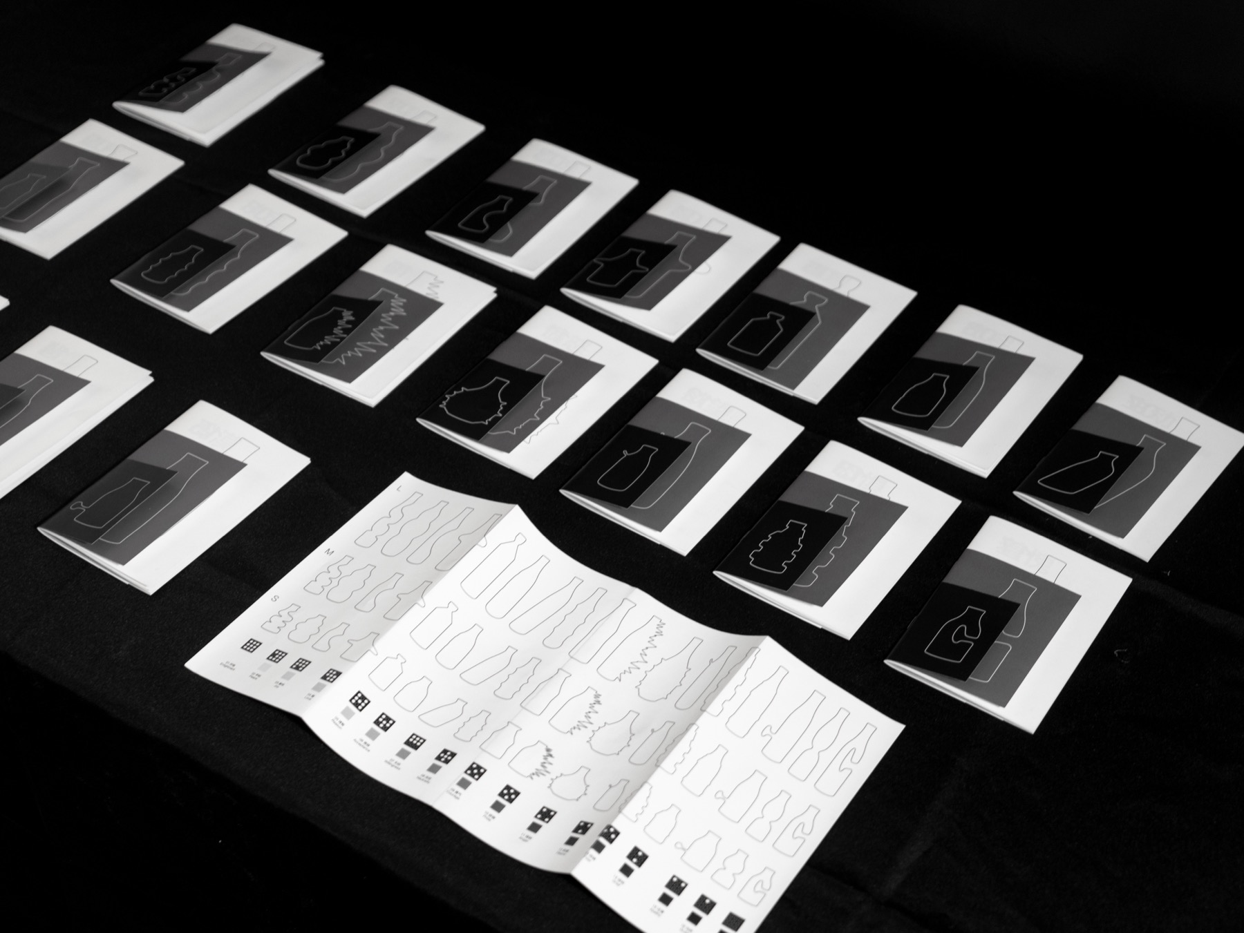Collection of printed bottle booklets