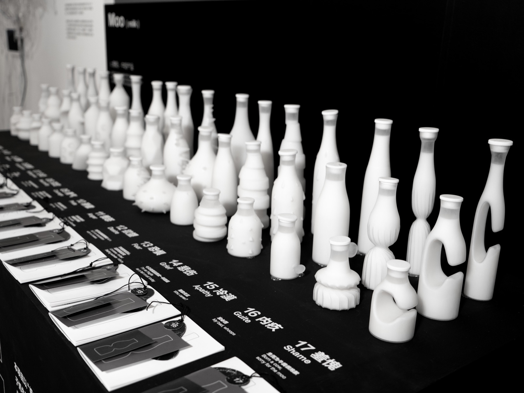 Rows of sculptural bottles at the exhibition