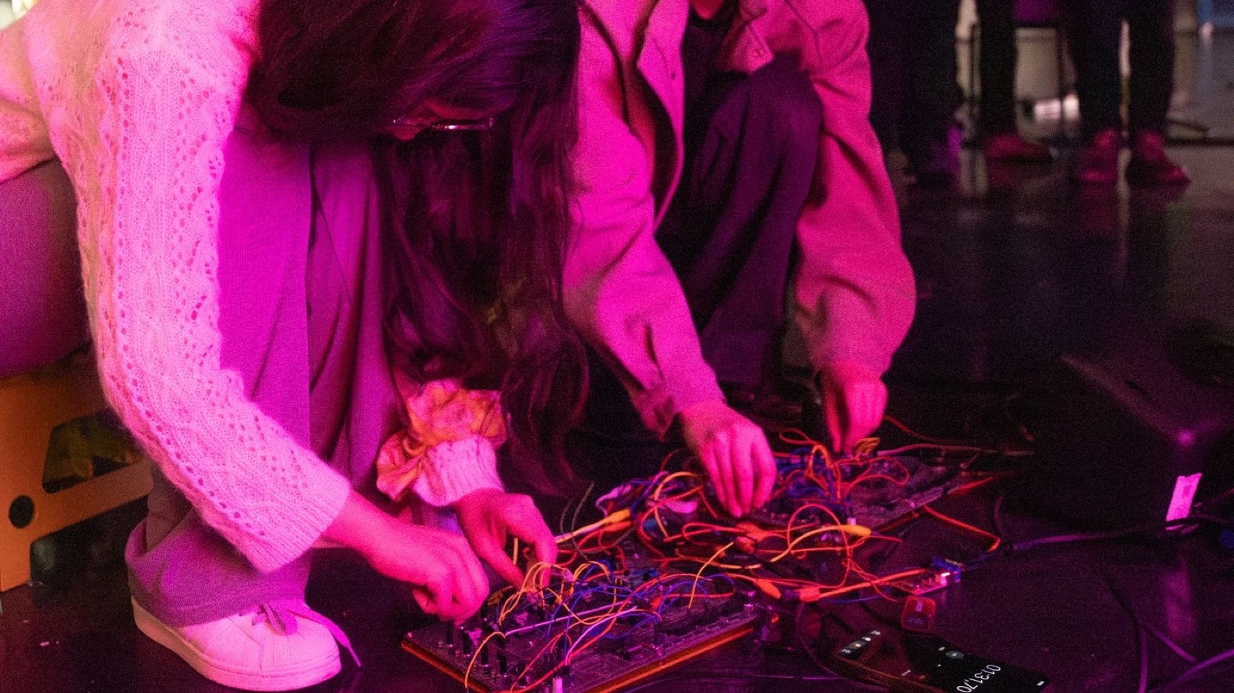 The performers operating the handmade circuit modules in Karlsruhe