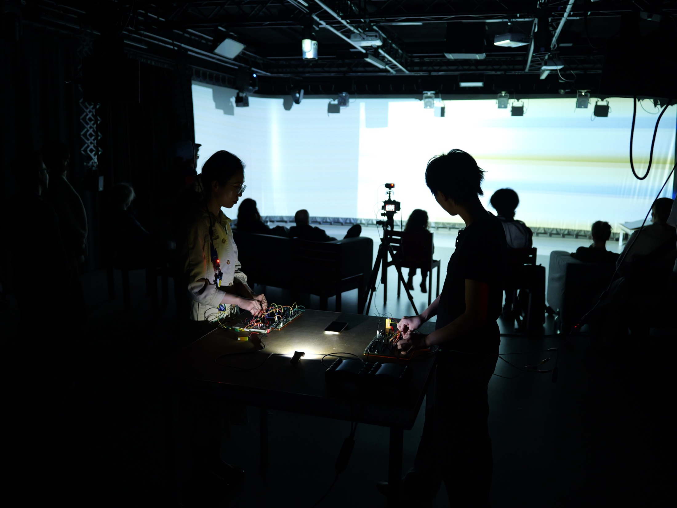 Xinyun Zhang and Yunfei Zhang performing with electronic circuits at STF Düsseldorf